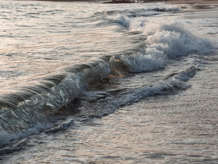 a person riding a surfboard on top of a wave, pexels contest winner, photorealism, evening sunlight, shoreline, rivulets, brown