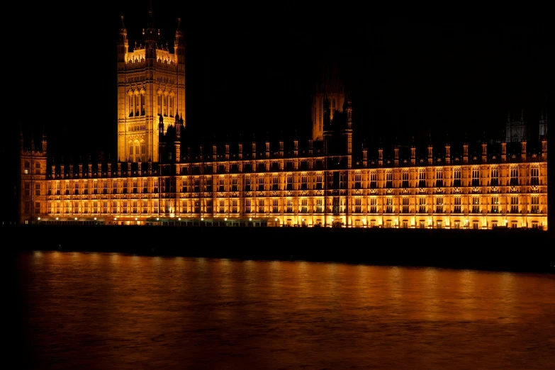 the big ben clock tower towering over the city of london at night, pexels contest winner, renaissance, minimalist, building along a river, gif, 2022 photograph