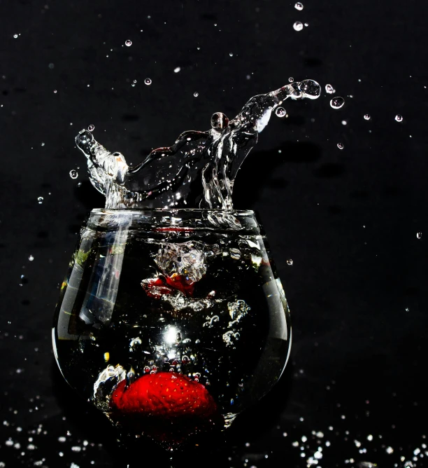 a strawberry splashing into a glass of water, an album cover, pexels, art photography, black splashes, bubbly underwater scenery, 4 k hd wallpapear, kiss