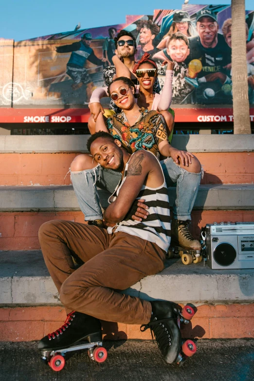 a group of people sitting on top of a skateboard, trending on pexels, black arts movement, lesbians, photograph of three ravers, medium format, hollywood promotional image