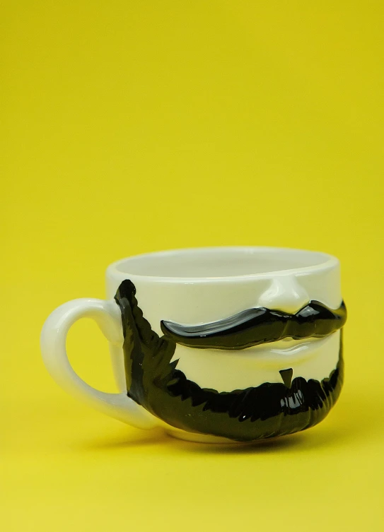 a close up of a coffee cup with a mustache on it, inspired by Muggur, pop art, seen from the side, black beard, bowl, glazed