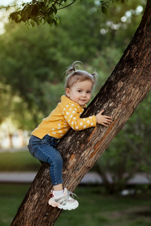 a little girl climbing a tree in a park, by Sven Erixson, pexels contest winner, photorealism, cute pose, 2 years old, modeled, various posed