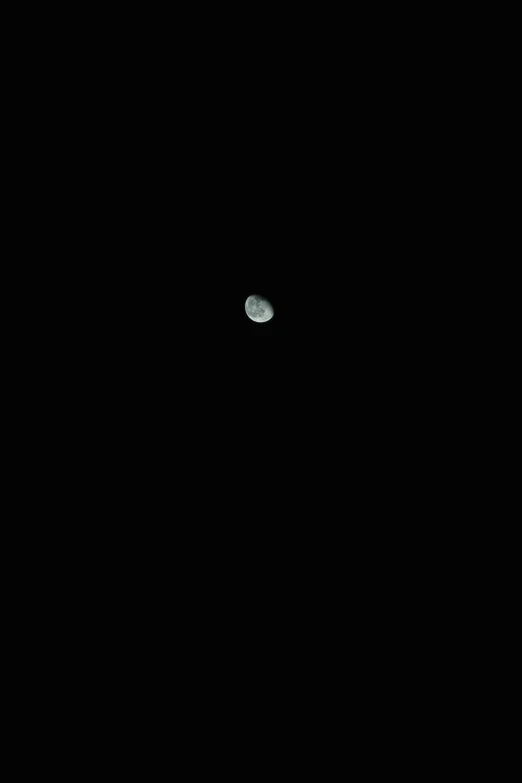 the moon is visible in the dark sky, a screenshot, unsplash, multiverse!!!!!!, floating. greenish blue, mars black, shot on sony a 7