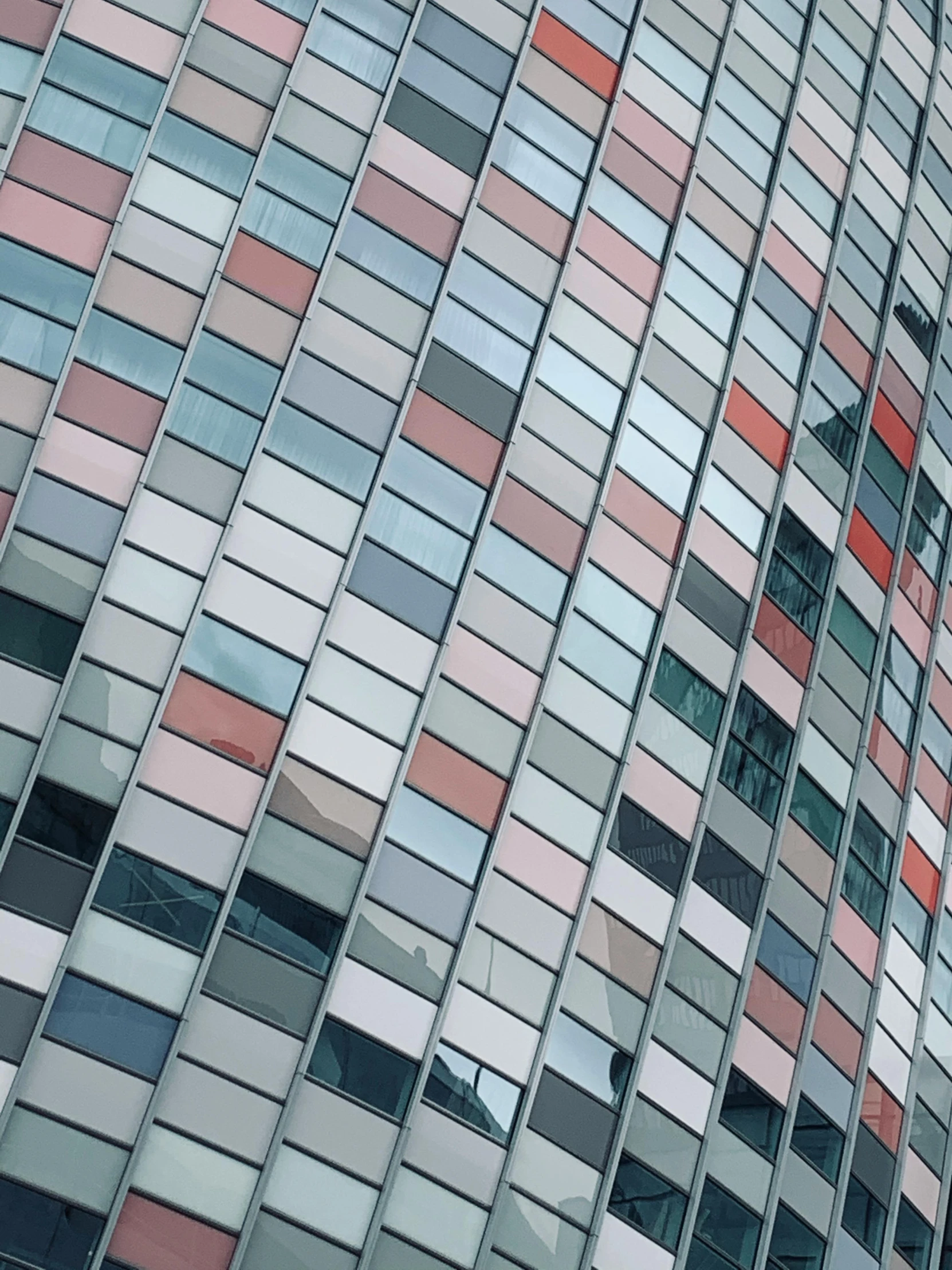 a very tall building with lots of windows, a mosaic, inspired by Andreas Gursky, unsplash, pink and grey muted colors, gray and orange colours, vinyl on glazing, metallic colors