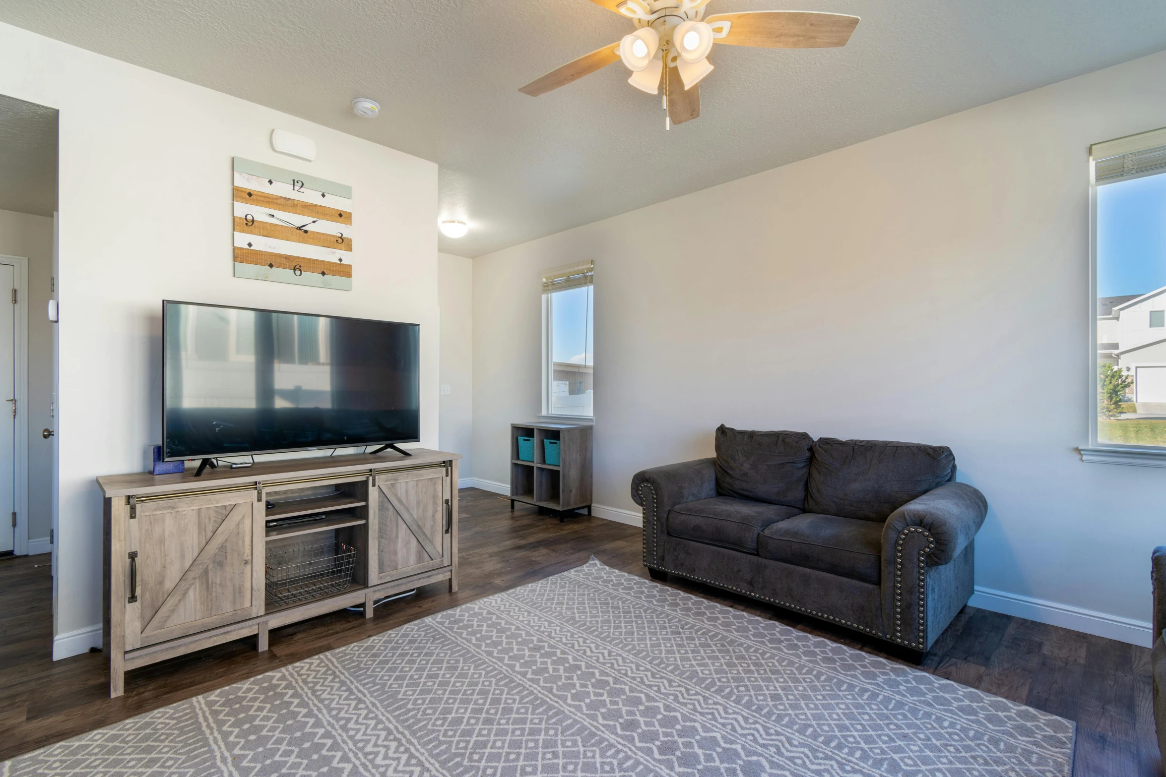 a living room filled with furniture and a flat screen tv, by Robbie Trevino, moab, sunny day time, modeled, square