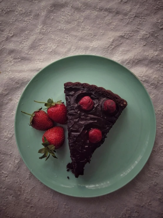 a piece of chocolate cake on a plate with strawberries, a pastel, by Elsa Bleda, cinematic shot ar 9:16 -n 6 -g, color”, black, day time