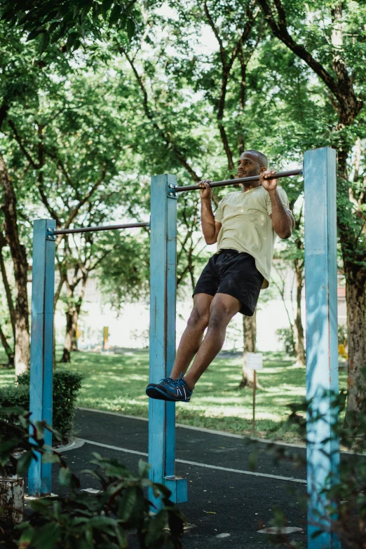 a man on a pull up bar in a park, a portrait, pexels contest winner, jamaica, square, dingy gym, hyperdetailed