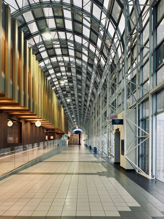 the inside of a building with a lot of windows, inspired by Andreas Gursky, unsplash contest winner, renaissance, cn tower, stone tile hallway, profile image, gold and steel intricate