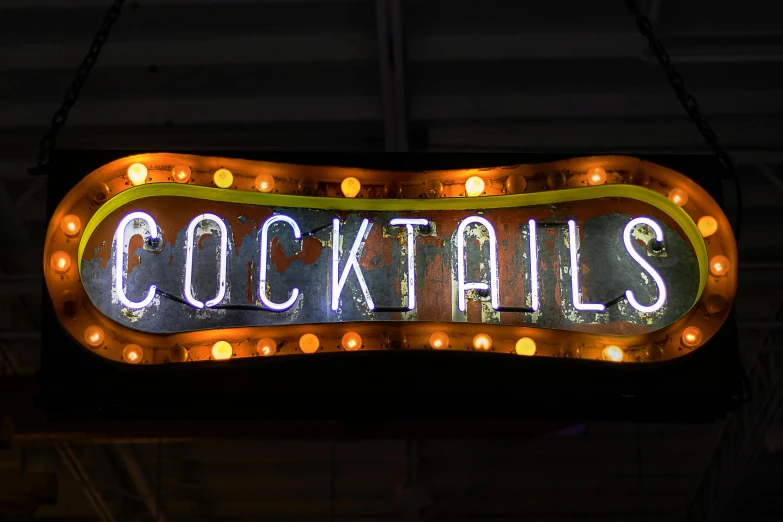 a neon sign that says cocktails hanging from a ceiling, a portrait, pexels, rectangle, night photo, market, 2 0 5 6