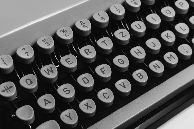 a black and white photo of an old typewriter, by Carey Morris, computer art, close-up photo, in retro colors, grey - scale, matt rhodes