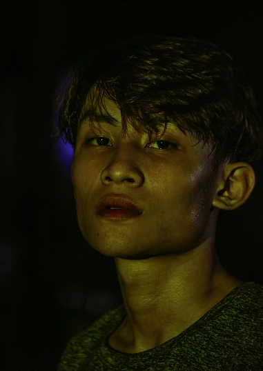a close up of a person in a dark room, an album cover, inspired by Chen Chi, sumatraism, portrait of a rugged young man, concert, ((portrait)), promo image