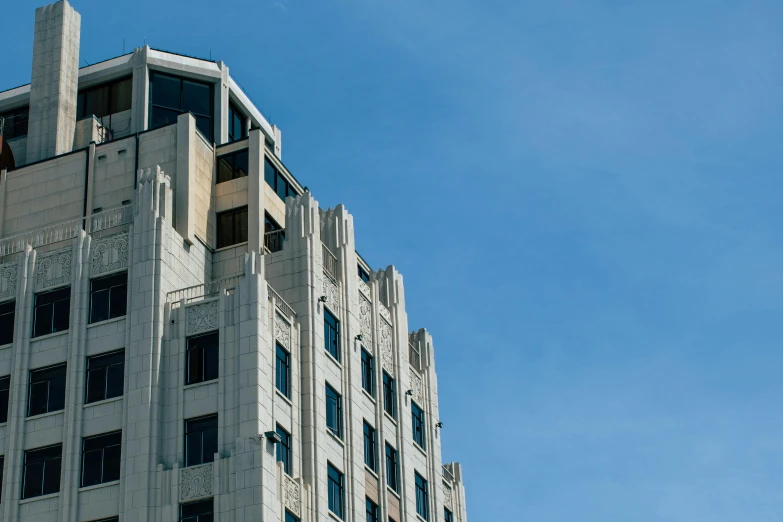 a tall building with a clock on top of it, an art deco sculpture, unsplash, brutalism, wellington, high details photo, up there, high quality photo