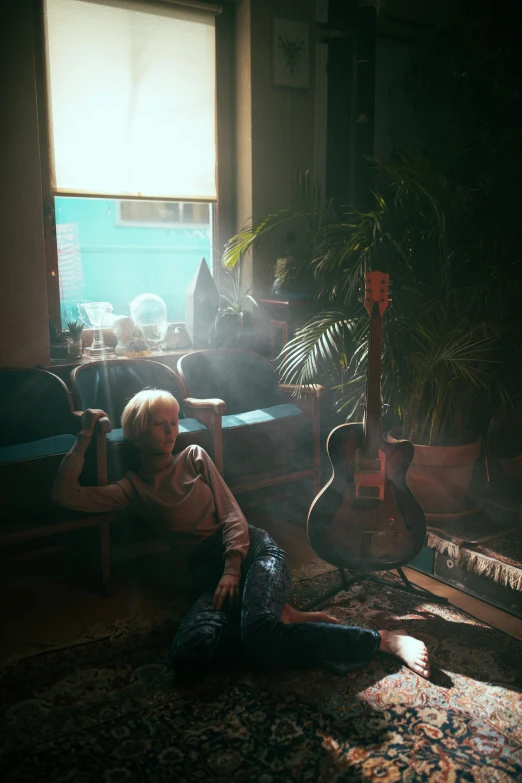 a child laying on the floor in a living room, an album cover, inspired by Elsa Bleda, light and space, cai xukun, sun flare, women playing guitar, beeple global illumination