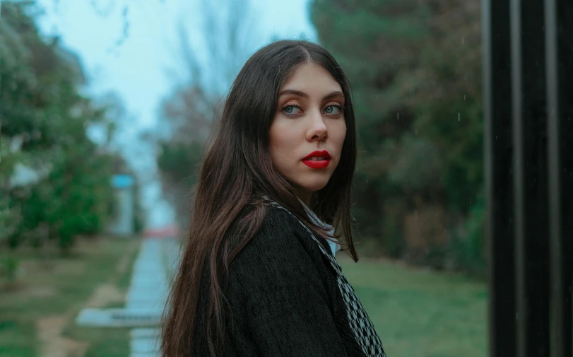 a beautiful young woman standing in front of a window, an album cover, inspired by Elsa Bleda, pexels contest winner, realism, in a park, thick red lips, beautiful iranian woman, long free black straight hair