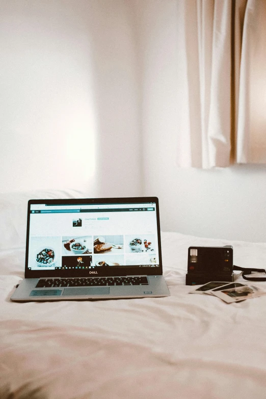 a laptop computer sitting on top of a bed, by Adam Rex, trending on pexels, happening, on a pale background, belongings strewn about, instagram picture, responsive