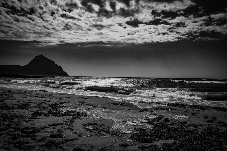 a black and white photo of a beach, a black and white photo, by andrei riabovitchev, taras susak, harmony of swirly clouds, sea and sky, fineartamerica