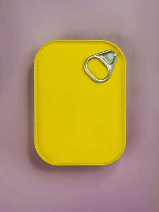 a yellow tray with a pair of scissors on it, by Lee Gatch, metal lid, mundane, 🍸🍋, hook as ring