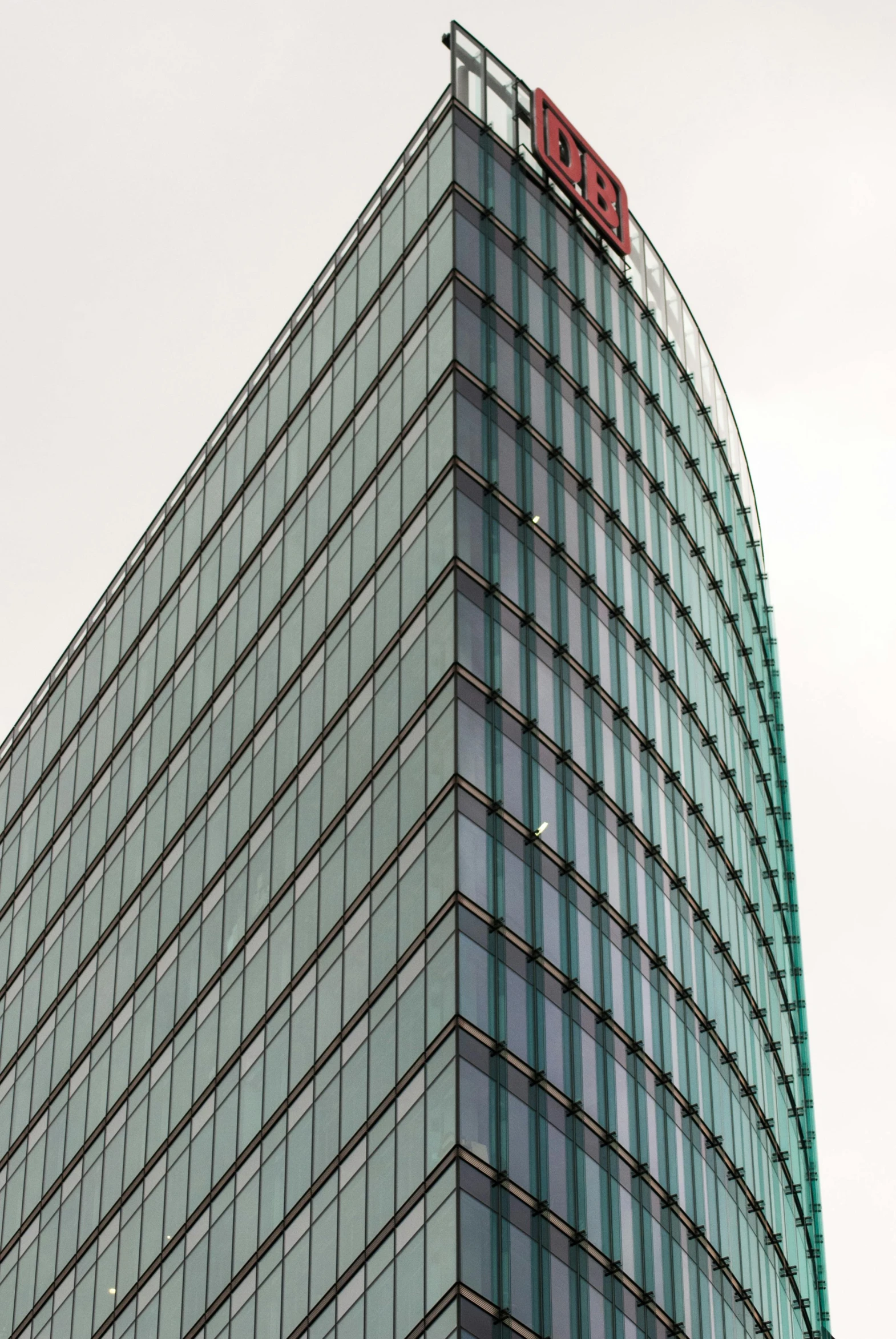a tall building with a sign on top of it, by Konrad Witz, glass panes, very detailed curve, 2 0 5 6, leica s photograph