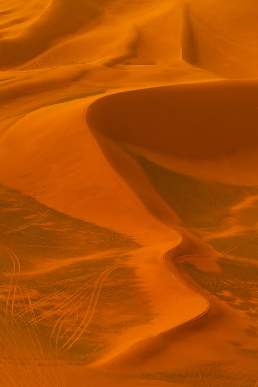 a person riding a horse in the desert, by Dave Melvin, pexels contest winner, land art, orange hue, sinuous, ultrafine detail ”, grain”