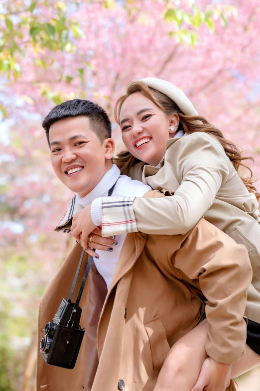 a man carrying a woman on his back, instagram, happening, under sakura tree, patiphan sottiwilaiphong, while smiling for a photograph, promo photo