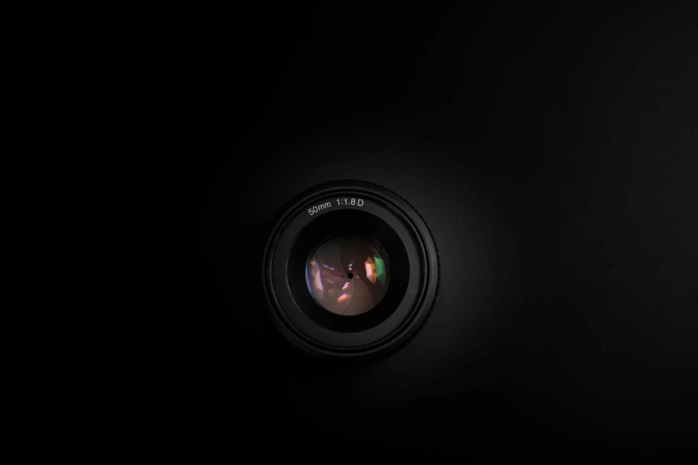 a close up of a camera lens on a black background, by Karl Buesgen, [ realistic photography ], f / 1. 9 6. 8 1 mm iso 4 0, prime lense)