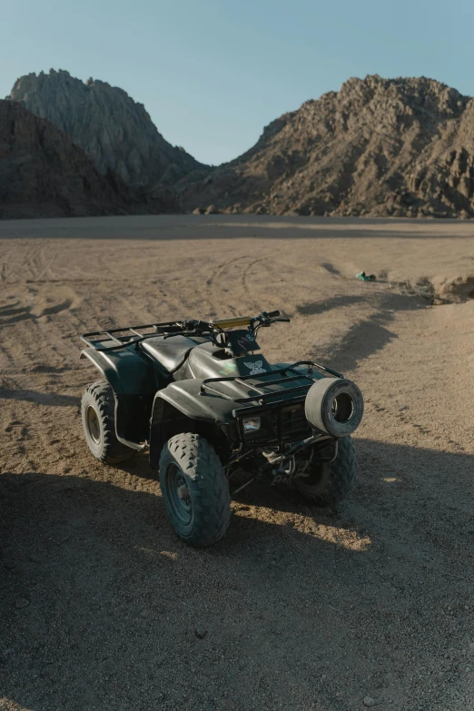 a couple of atvs that are sitting in the dirt, a picture, by Daniel Seghers, unsplash, dau-al-set, sci-fi movie still, pbr, at the desert, grey
