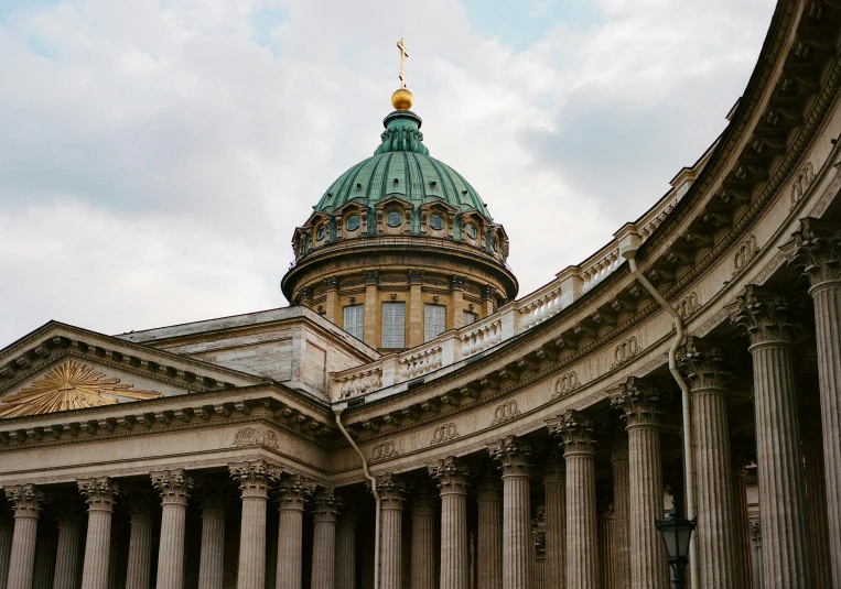 a large building with a dome on top of it, a photo, by Julia Pishtar, pexels contest winner, neoclassicism, colonnade, saint petersburg, 2000s photo, brown