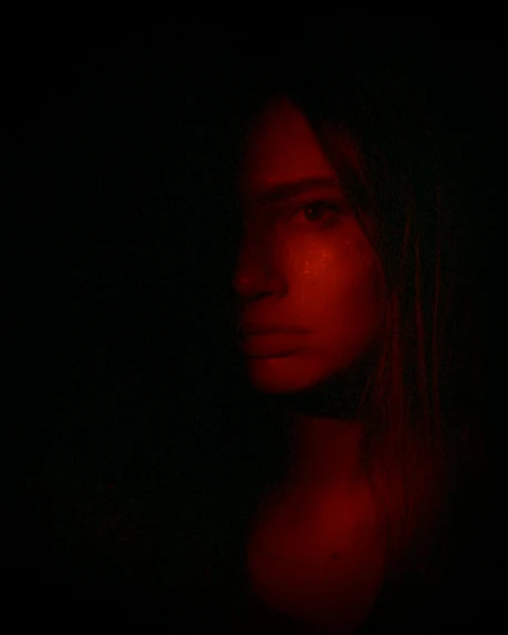 a woman with long hair in the dark, an album cover, inspired by Elsa Bleda, unsplash, antipodeans, red glowing skin, portrait emily ratajkowski, very very low quality picture, instagram picture