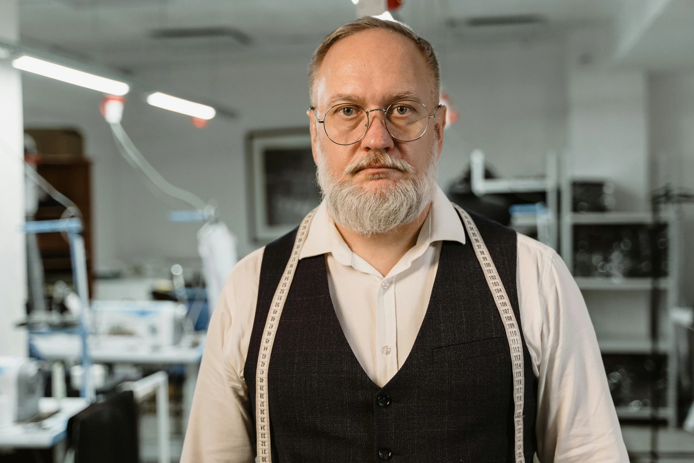 a man with a beard wearing glasses and a vest, by László Balogh, unsplash, art nouveau, stood in a lab, professor clothes, fashion designer, 15081959 21121991 01012000 4k