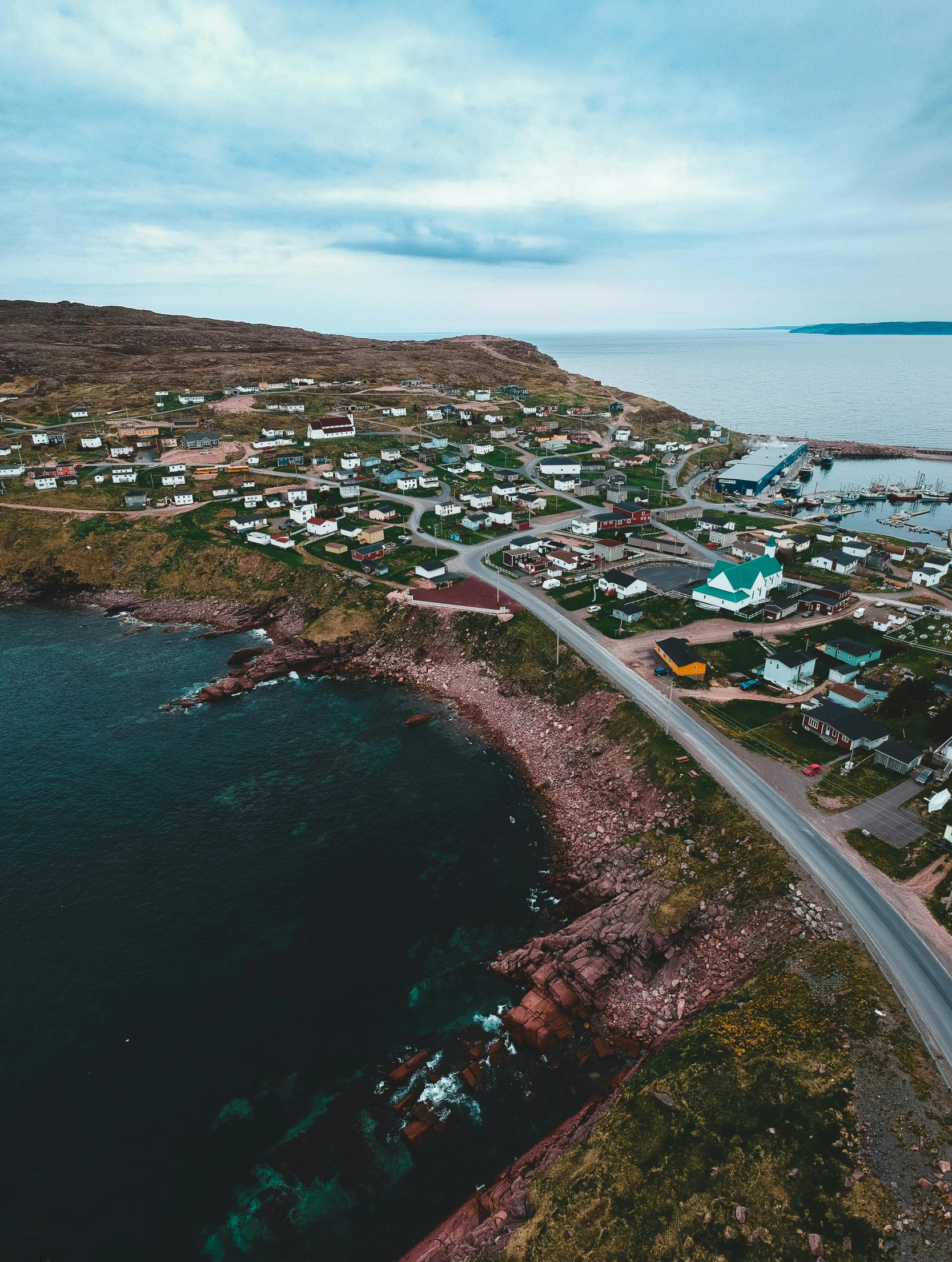 an aerial view of a small town next to a body of water, profile image, yggrdasil, sarenrae, high quality image