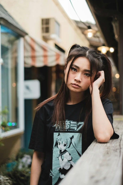 a woman sitting on top of a wooden bench, a cartoon, inspired by Kaii Higashiyama, unsplash, realism, black t shirt, young cute wan asian face, 1 6 years old, stern look