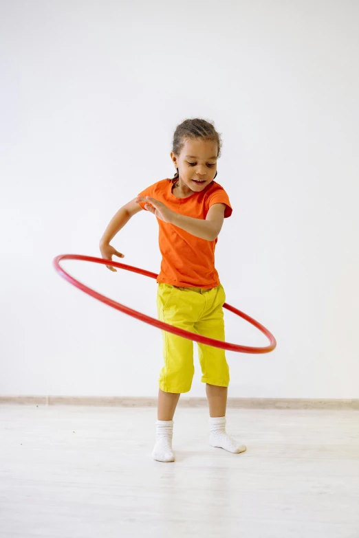 a little girl playing with a hula hoop, by Nina Hamnett, perfect dynamic posture, multi-part, small