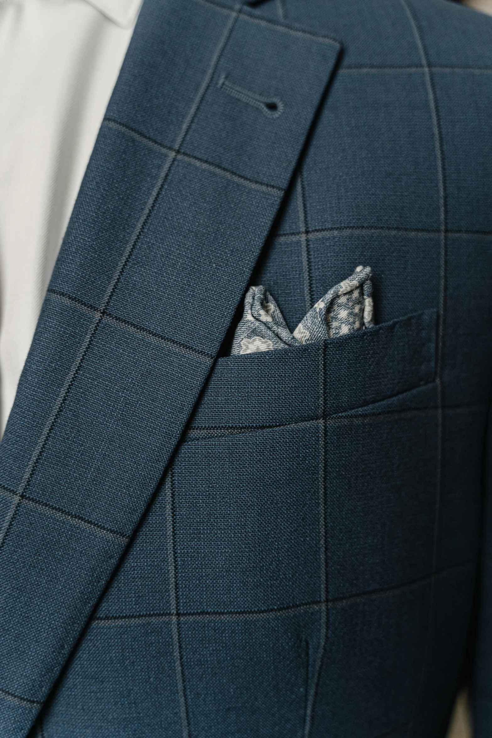 a suit on a mannequin mannequin mannequin mannequin mannequin mannequin mannequin mannequin, featured on reddit, zoomed out to show entire image, blue and grey, squares, with two front pockets