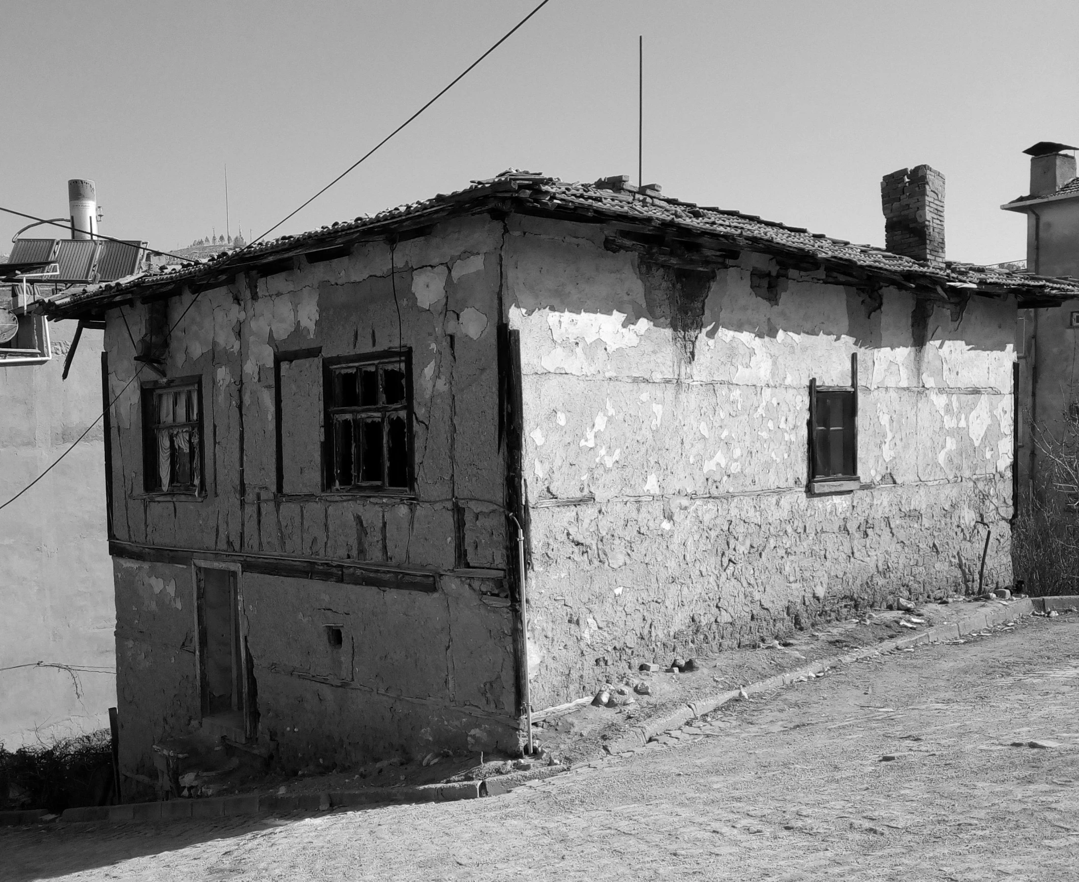 a black and white photo of an old building, by Muggur, turkey, very poor, background image, profile picture 1024px