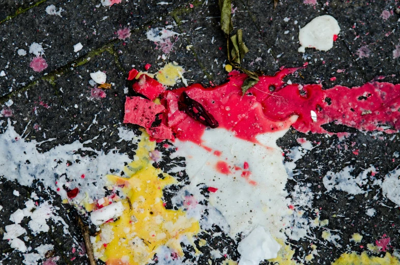 a piece of food that has been left on the ground, inspired by Pollock, unsplash, bubble gum, pyrotechnics, dezeen, paper