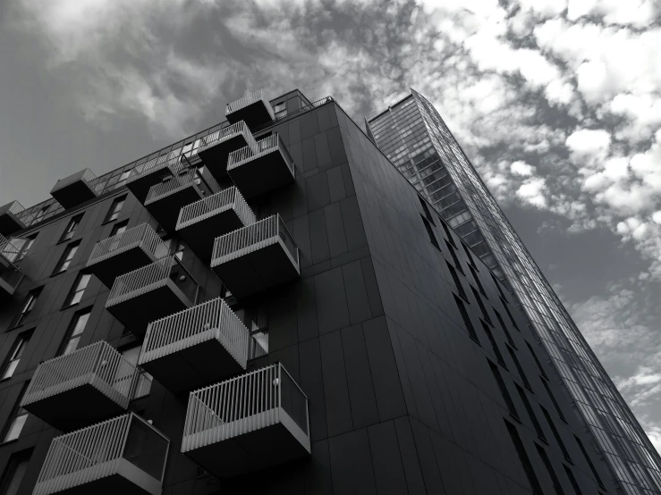 a black and white photo of a tall building, inspired by Thomas Struth, pexels contest winner, brutalism, black house, balconies, monochrome color, monochrome:-2