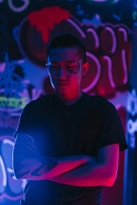 a man standing in front of a neon sign, inspired by Liam Wong, unsplash, portrait of chester bennington, bisexual lighting, cai xukun, profile image