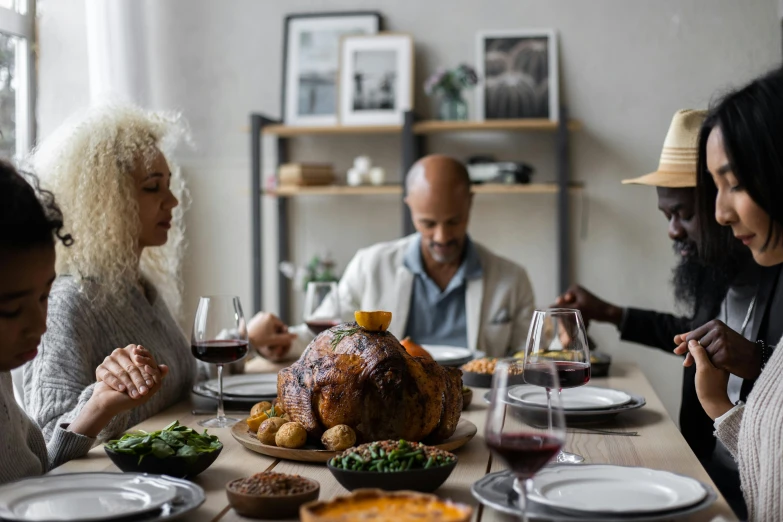 a group of people sitting around a dinner table, cornucopia, fan favorite, holiday season, profile image