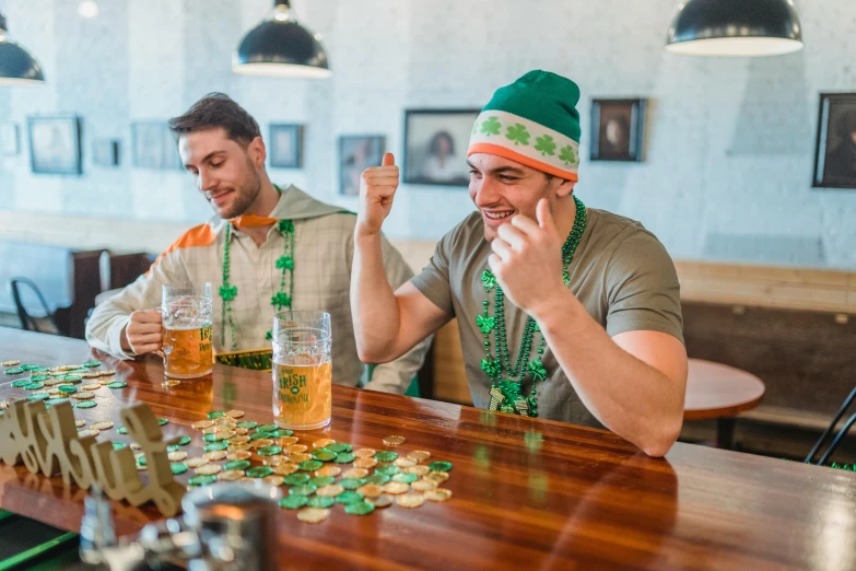 two men sitting at a bar drinking beer, pexels contest winner, four leaf clover, children playing with pogs, green clothes, celtics