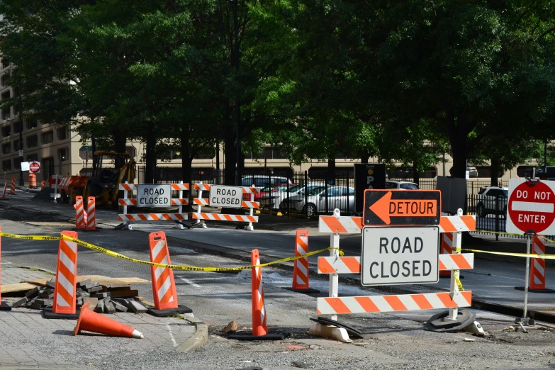 a group of construction signs sitting on the side of a road, happening, city street, pentagon, full device, thumbnail