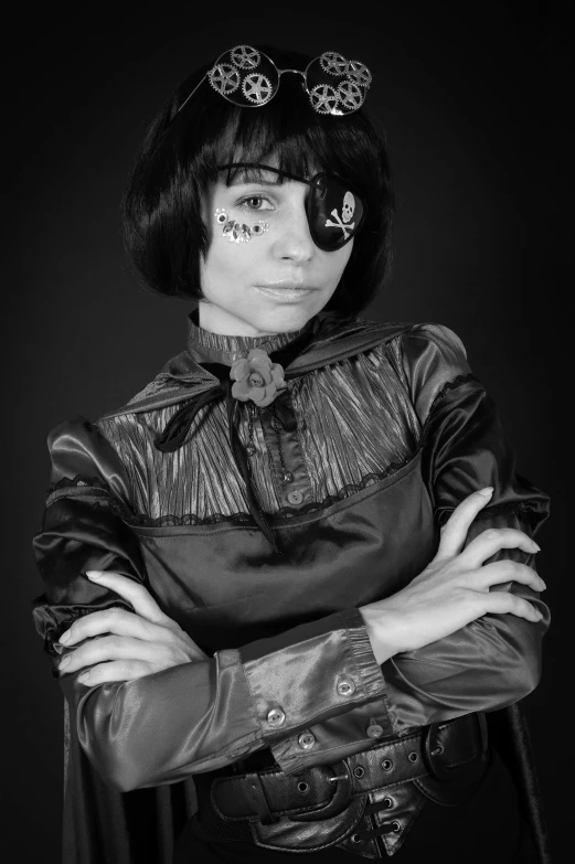 a black and white photo of a woman in a costume, a character portrait, inspired by August Sander, vanitas, in a space cadet outfit, black hair and large eyes, willy wonka, portrait imagery!!!!!