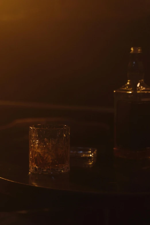 a candle sitting on top of a table next to a glass, inspired by Elsa Bleda, trending on polycount, photorealism, whisky, 2 0 2 1 cinematic 4 k framegrab, saturday night in a saloon, ( ( theatrical ) )