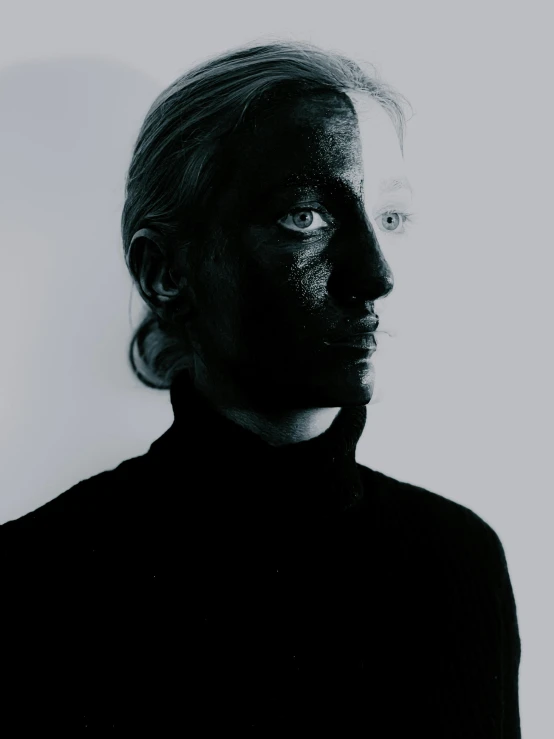 a black and white photo of a man with white paint on his face, a black and white photo, inspired by Anna Füssli, reddit, johan liebert, humanoid woman, reflective skin, alternate album cover