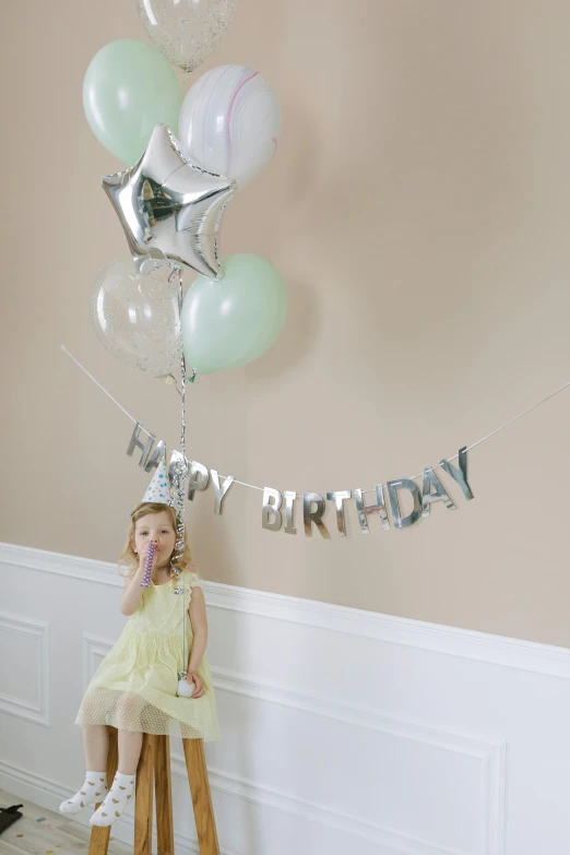 a little girl sitting on a stool holding a bunch of balloons, white and teal metallic accents, banner, medium close up shot, 3 - piece