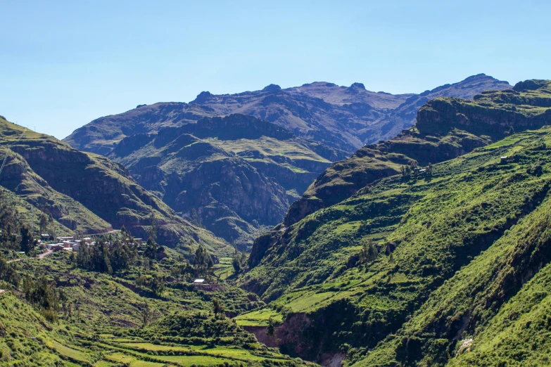 a view of a valley with mountains in the background, hurufiyya, avatar image, conde nast traveler photo, background image