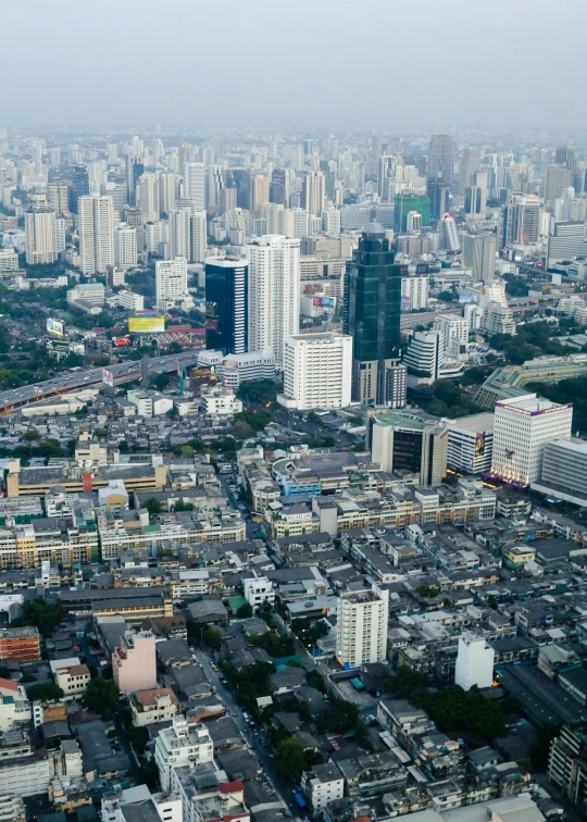 an aerial view of a city with tall buildings, happening, bangkok, fujifilm”, square, 8k ”