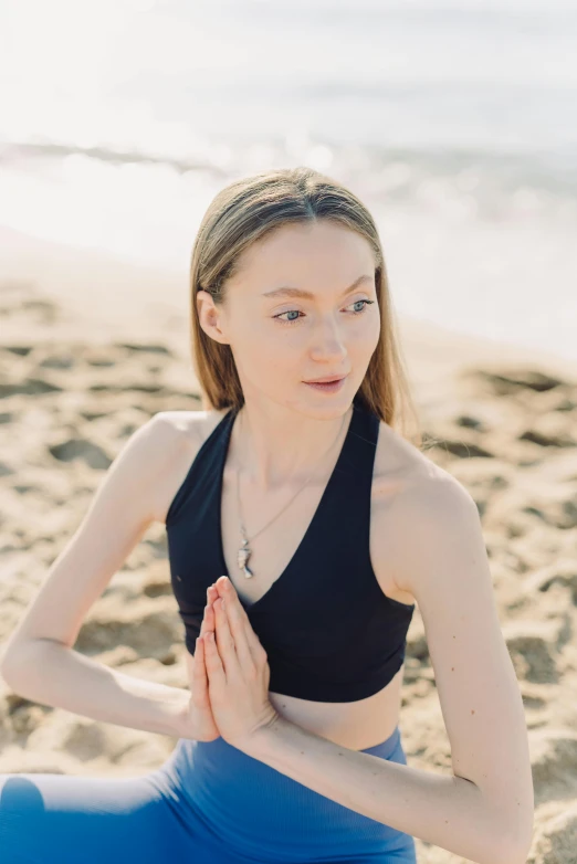 a woman is doing yoga on the beach, by Julia Pishtar, renaissance, bone jewellery, avatar image, profile picture, sydney sweeney