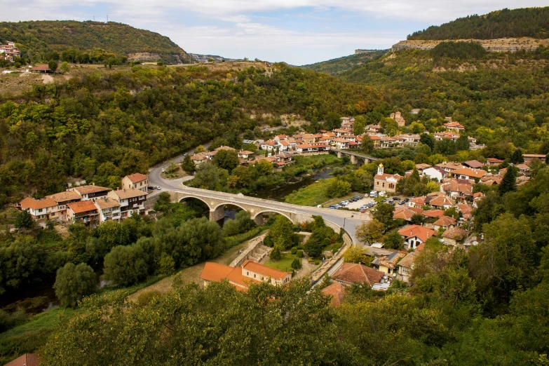 an aerial view of a small town in the mountains, by Edward Avedisian, pexels contest winner, renaissance, all buildings on bridge, square, taras susak, high quality print