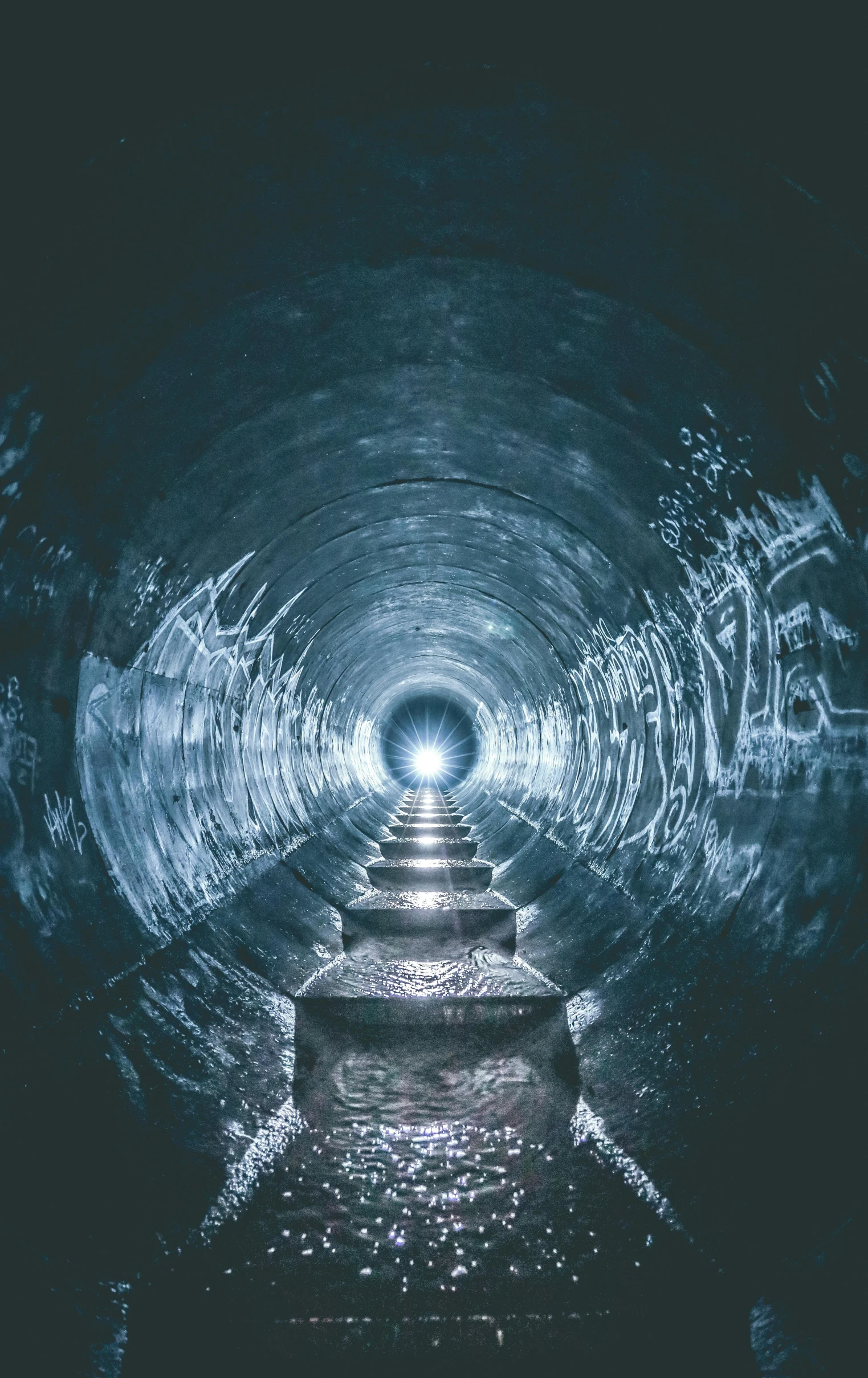 a dark tunnel with a light at the end, an album cover, by Adam Szentpétery, unsplash contest winner, water pipe, giant crypto vault, sewage, hypnosis