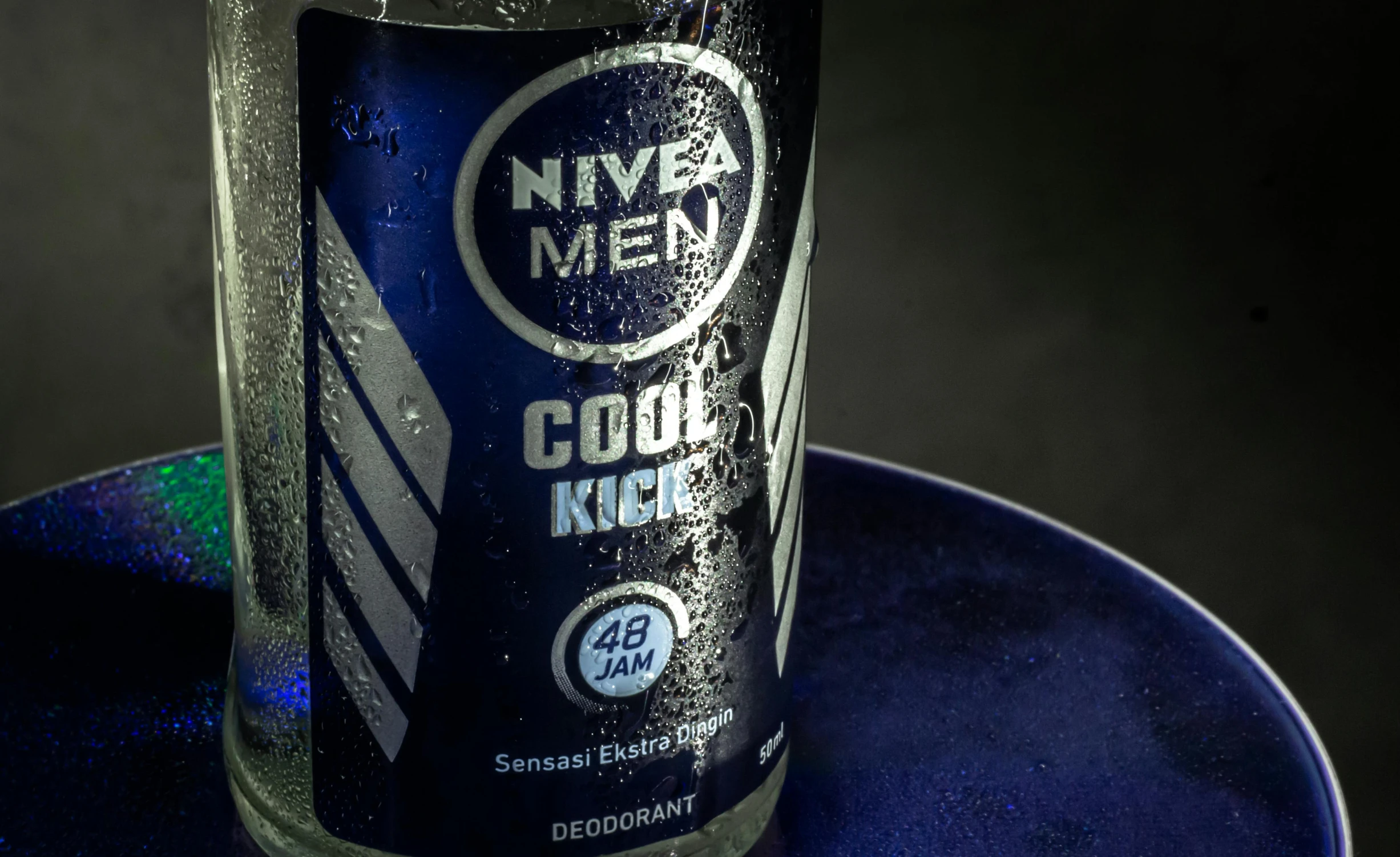 a can of nivea men cool kick on a blue plate, pexels contest winner, neo-dada, cyberpunk strip clubs, 4 0 k, cold mist, thumbnail